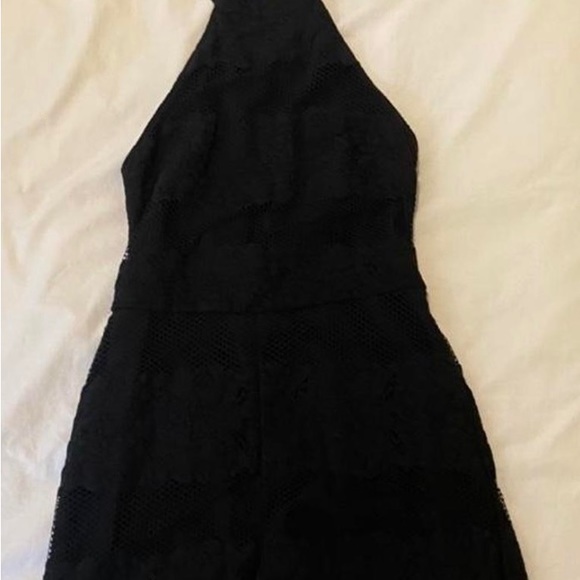 Guess romper. Black, cocktail tie around the neck. Size M - Picture 2 of 3